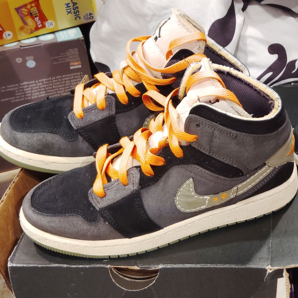Black and Gray High-Top Sneakers with Orange Laces